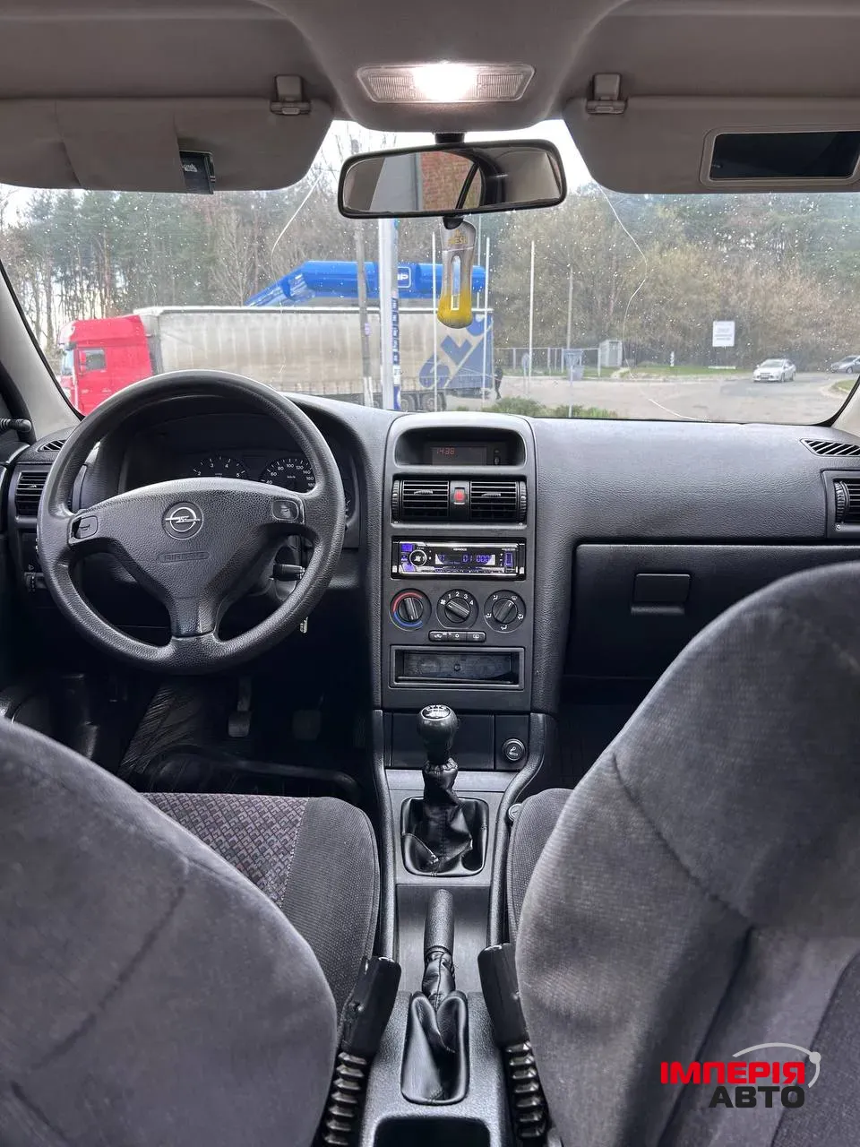 Opel Astra - фото 8