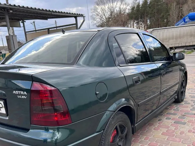 Opel Astra - фото 5