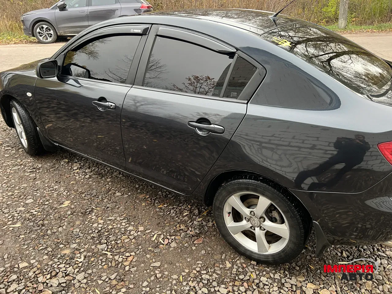 Mazda 3 - фото 4