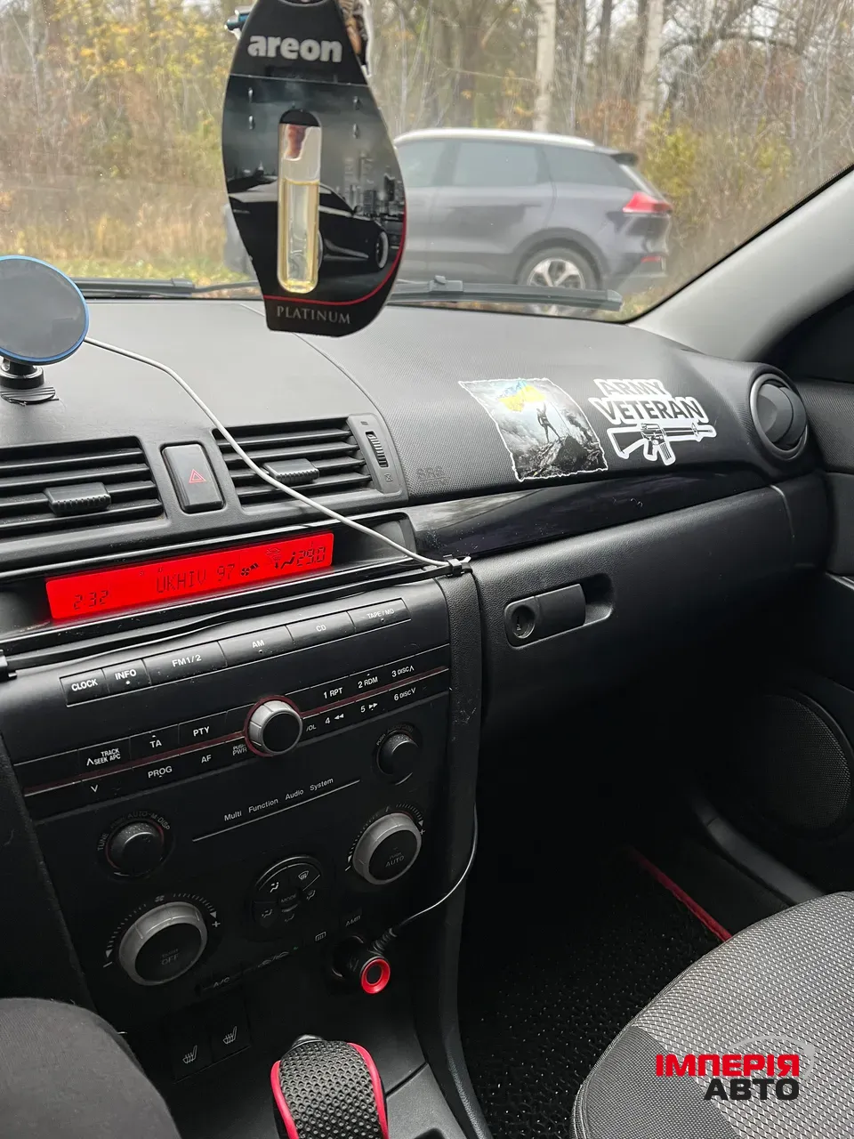 Mazda 3 - фото 10