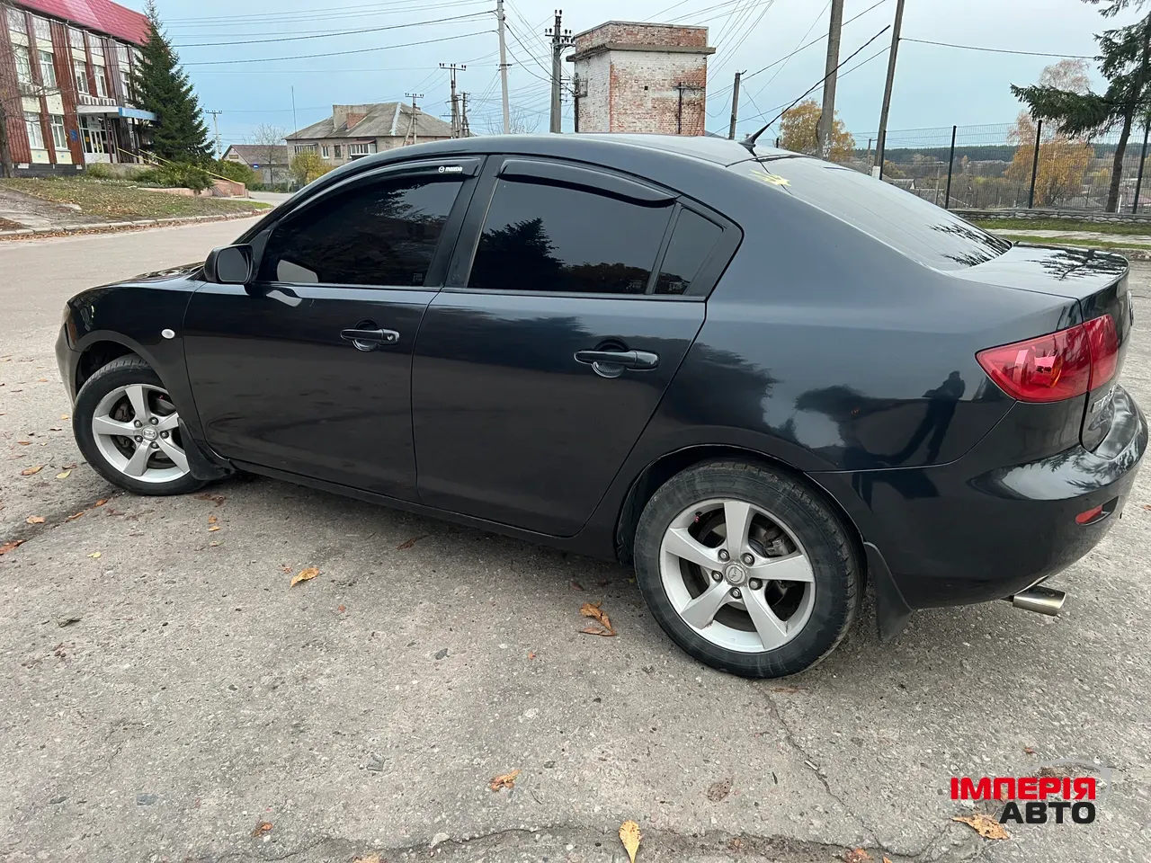 Mazda 3 - фото 8