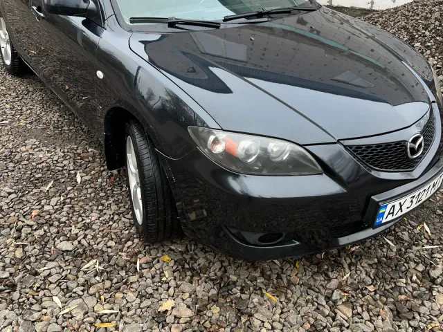 Mazda 3 - фото 1