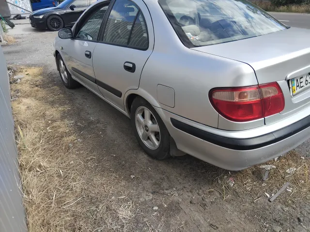 Nissan Almera - фото 4