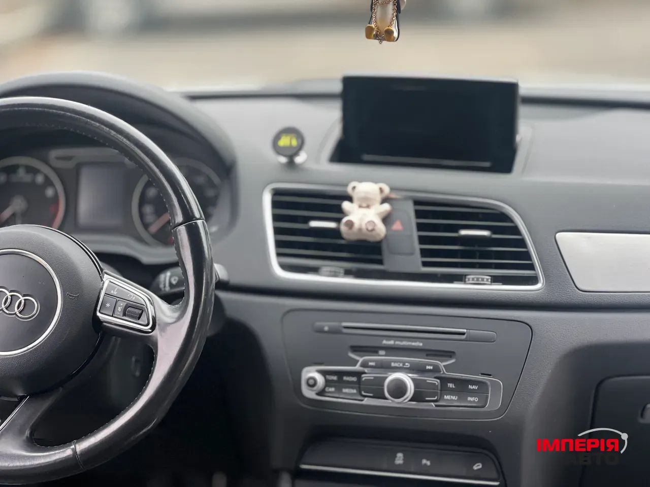 Audi Q3 - фото 16