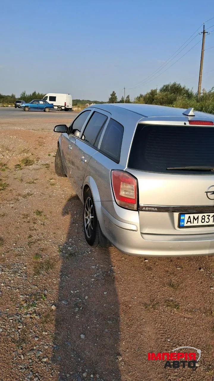 Opel Astra - фото 7