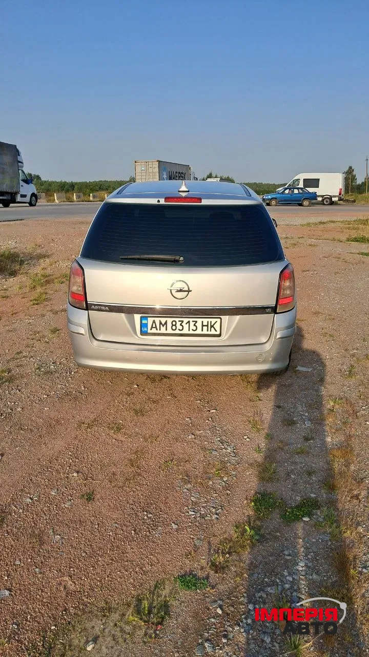 Opel Astra - фото 5