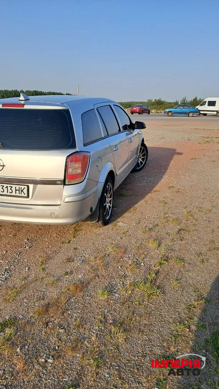 Opel Astra - фото 6