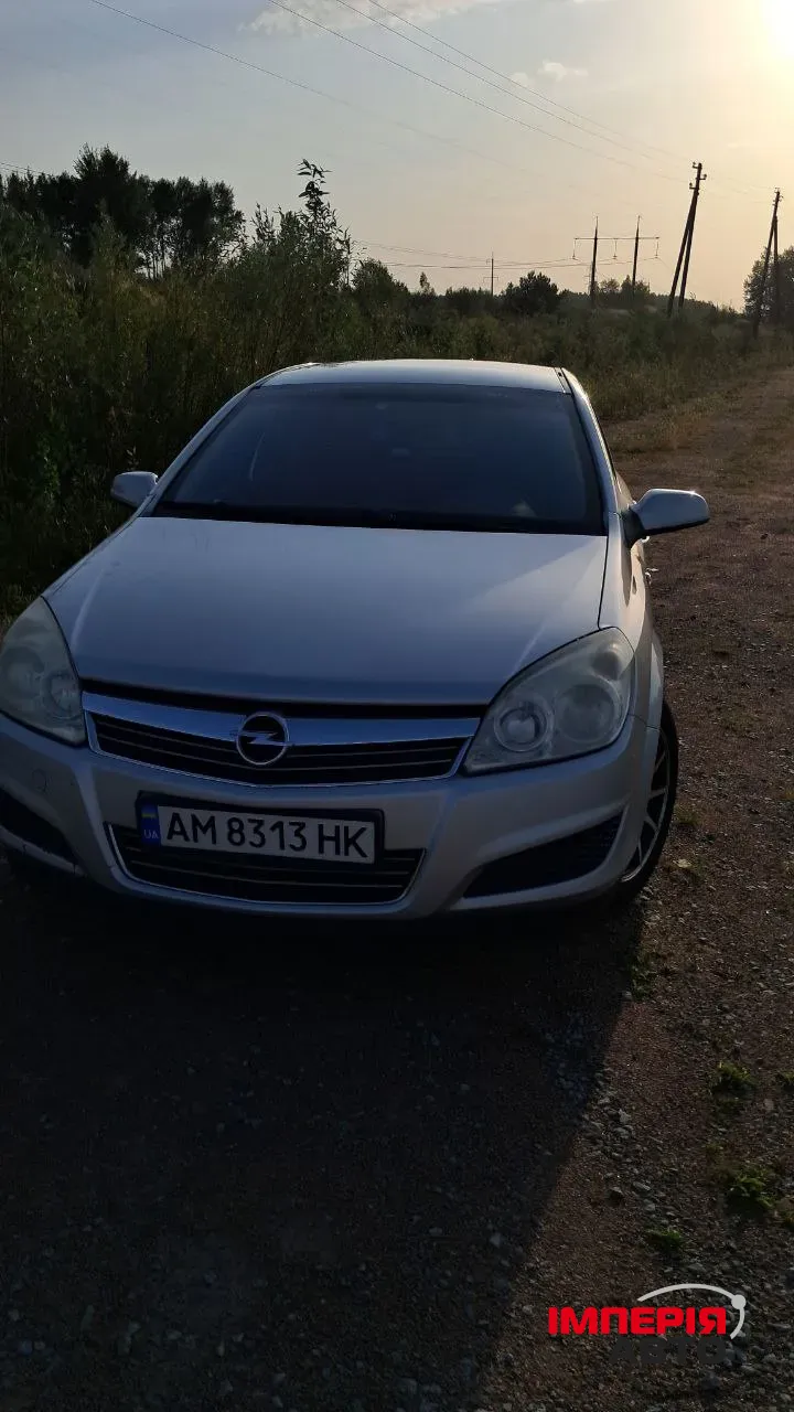 Opel Astra - фото 1