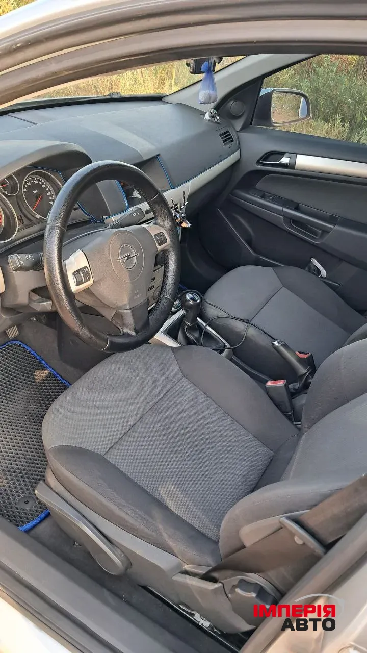 Opel Astra - фото 8
