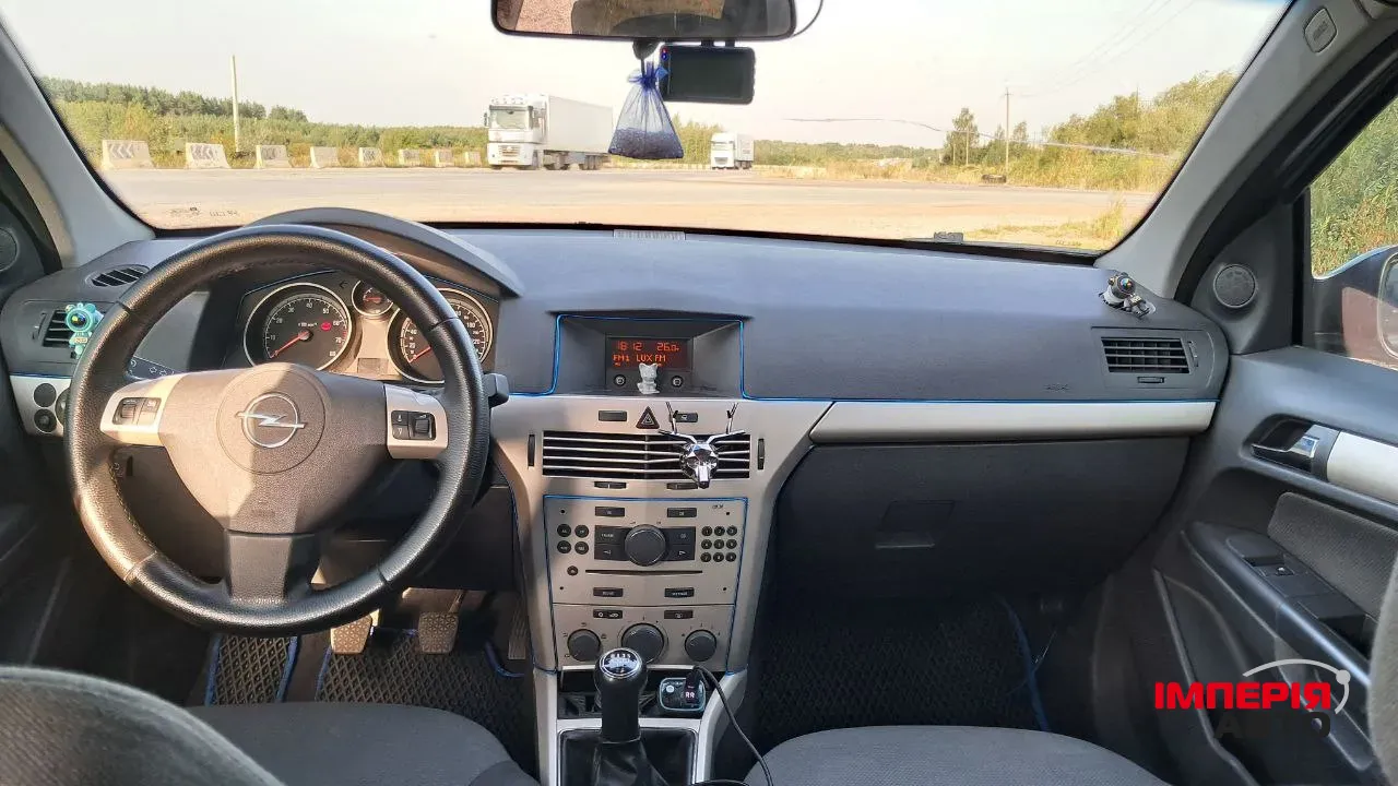 Opel Astra - фото 10