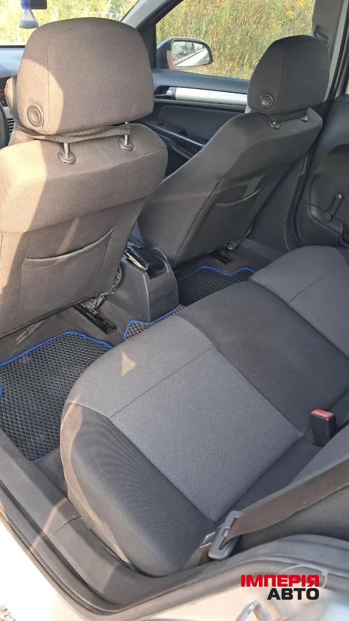 Opel Astra - фото 9