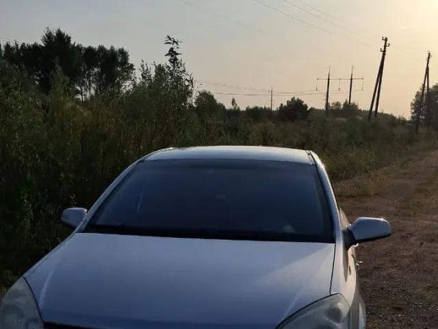 Opel Astra - фото 1
