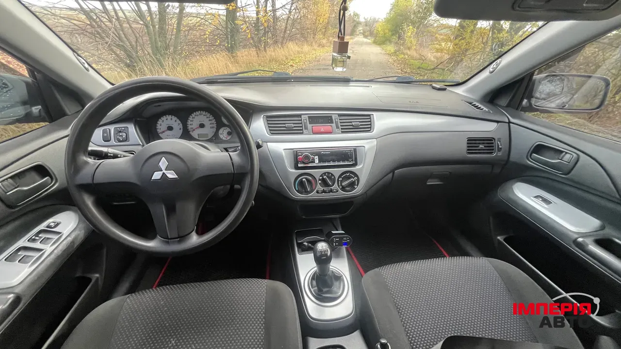 Mitsubishi Lancer - фото 12