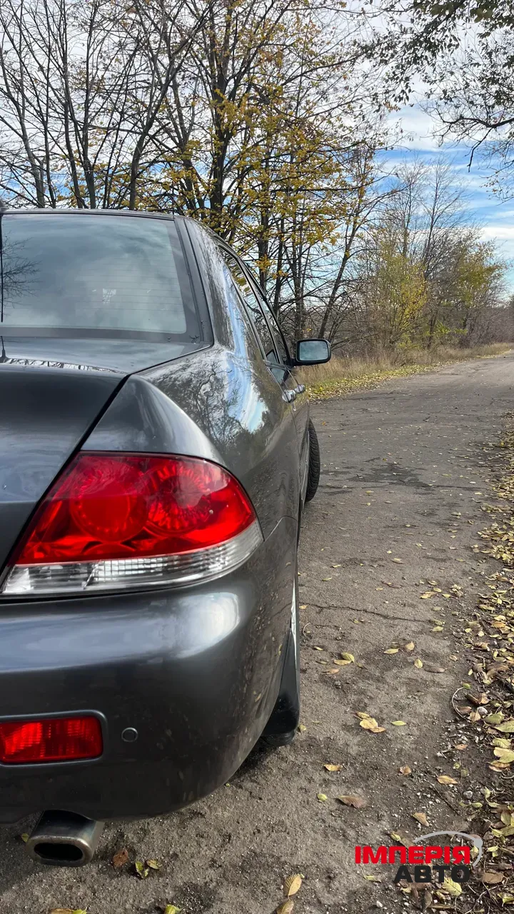 Mitsubishi Lancer - фото 7
