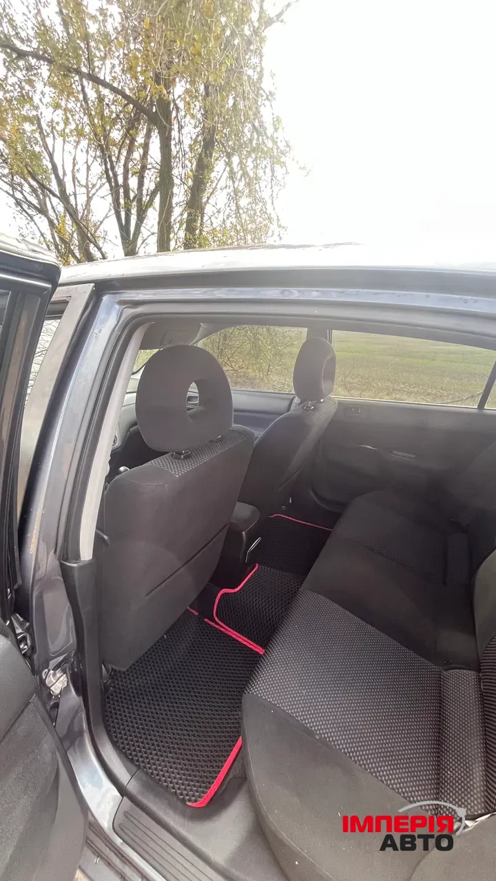 Mitsubishi Lancer - фото 11