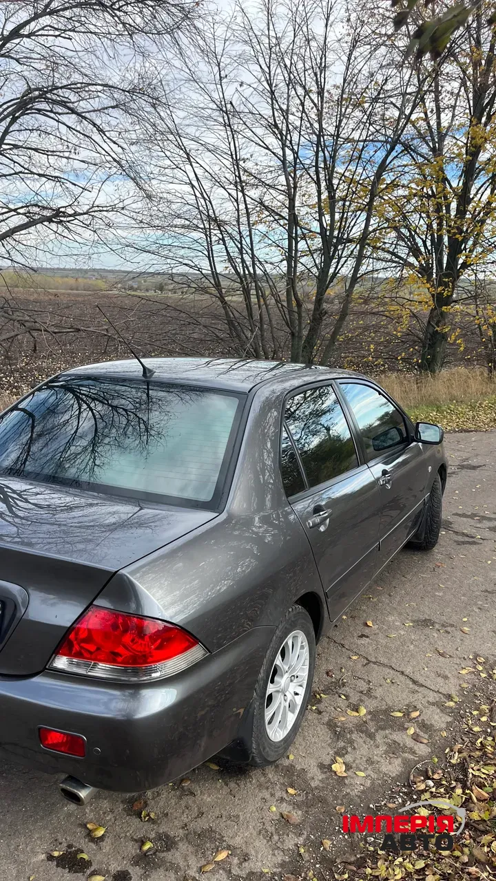 Mitsubishi Lancer - фото 10