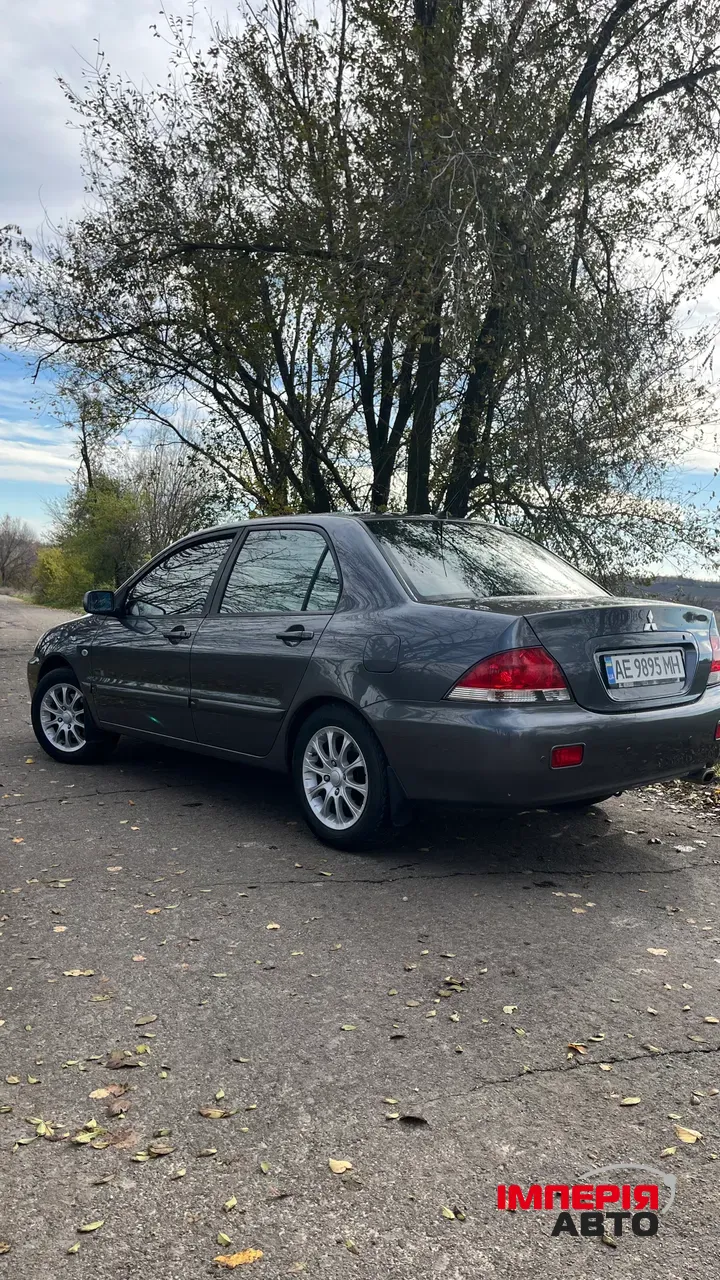 Mitsubishi Lancer - фото 4