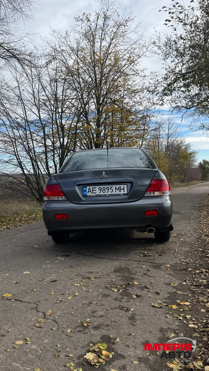 Mitsubishi Lancer - фото 5