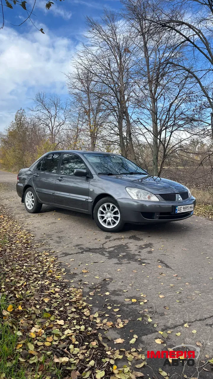 Mitsubishi Lancer - фото 1