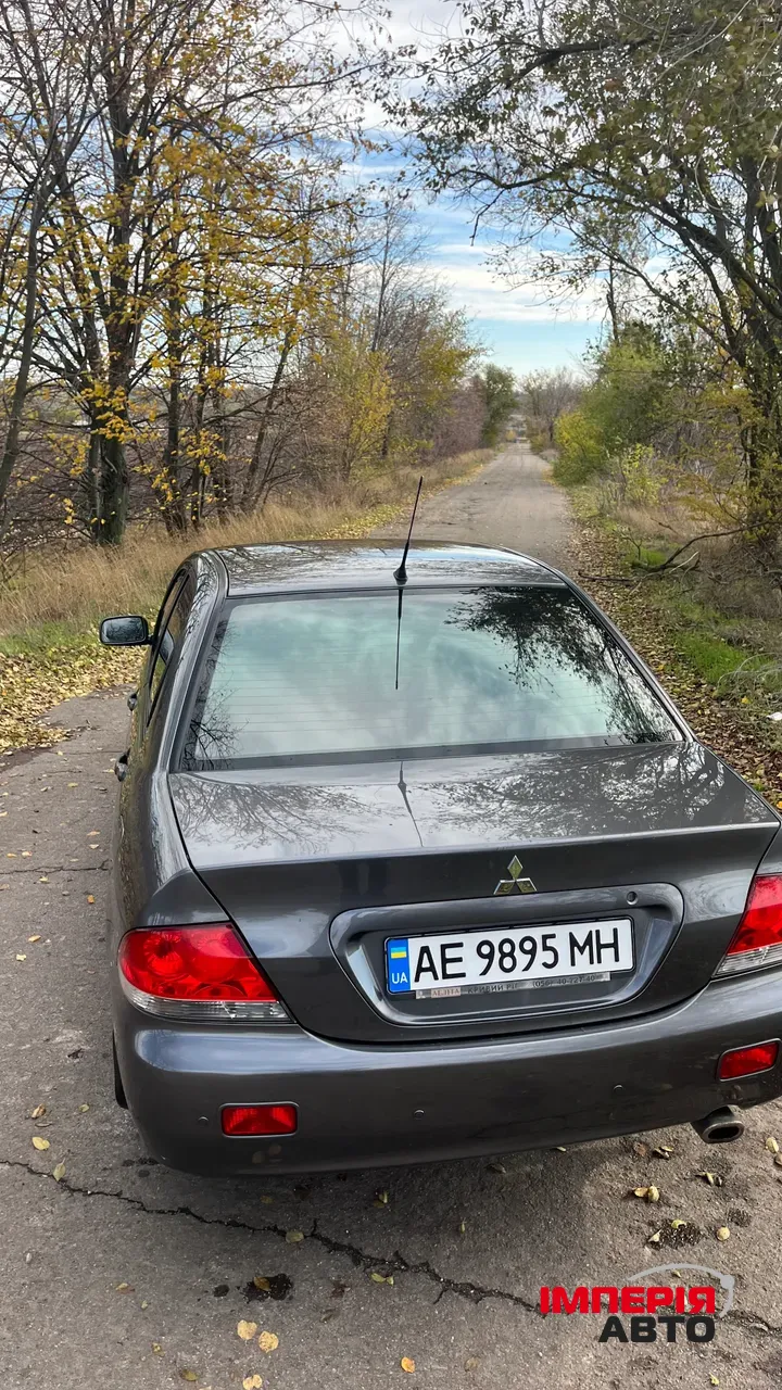 Mitsubishi Lancer - фото 9