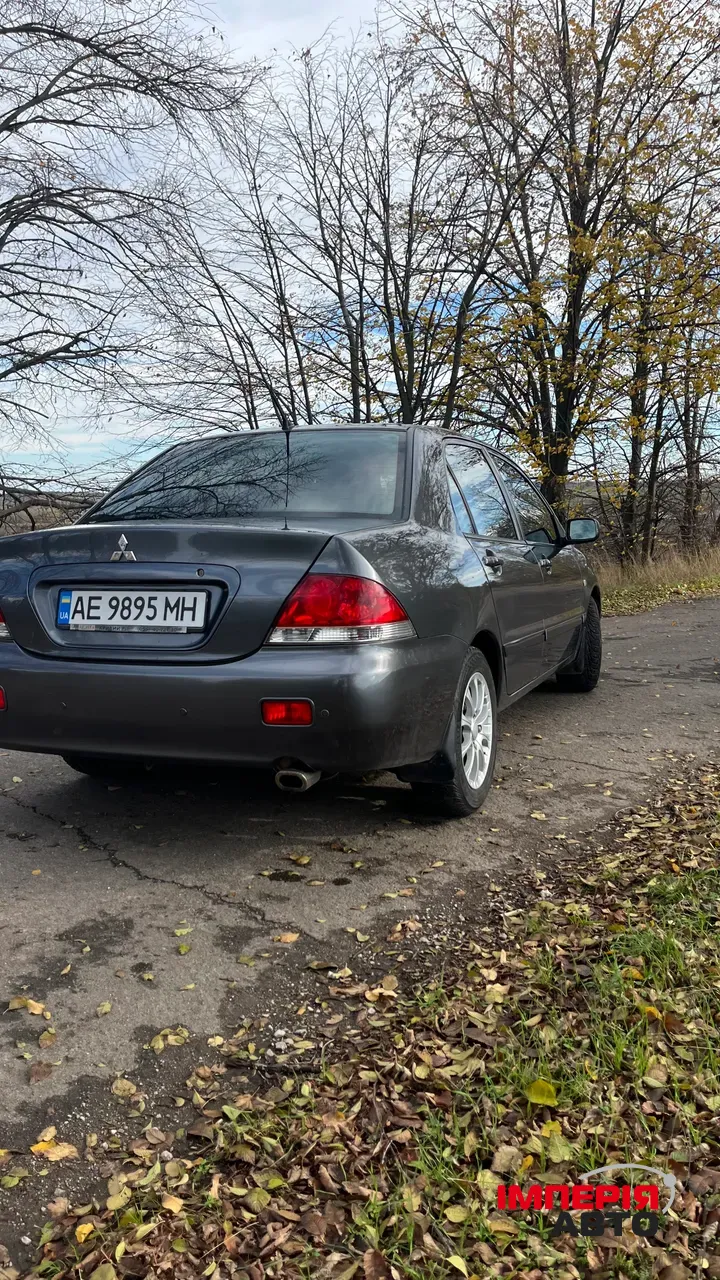 Mitsubishi Lancer - фото 6