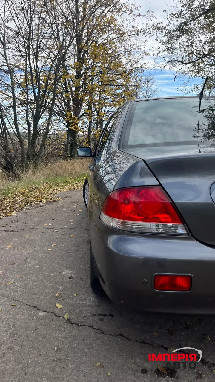 Mitsubishi Lancer - фото 8