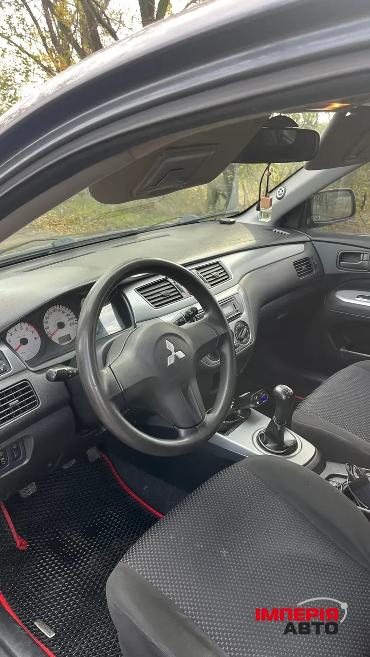 Mitsubishi Lancer - фото 13