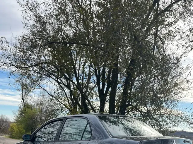 Mitsubishi Lancer - фото 4