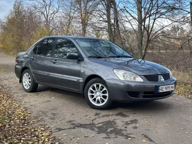 Mitsubishi Lancer - фото 1