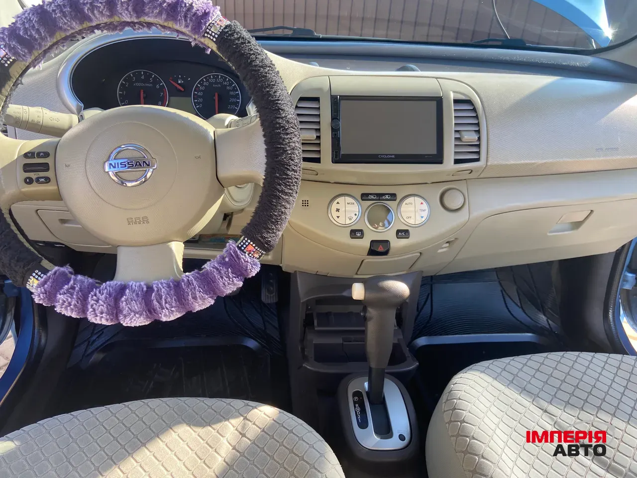 Nissan Micra - фото 12