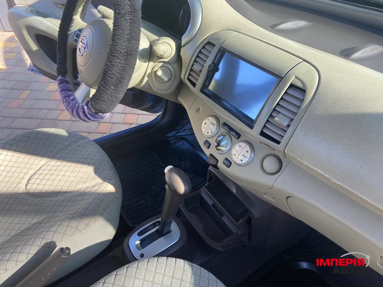 Nissan Micra - фото 16