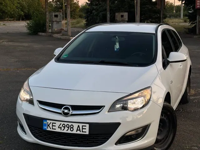 Opel Astra - фото 1