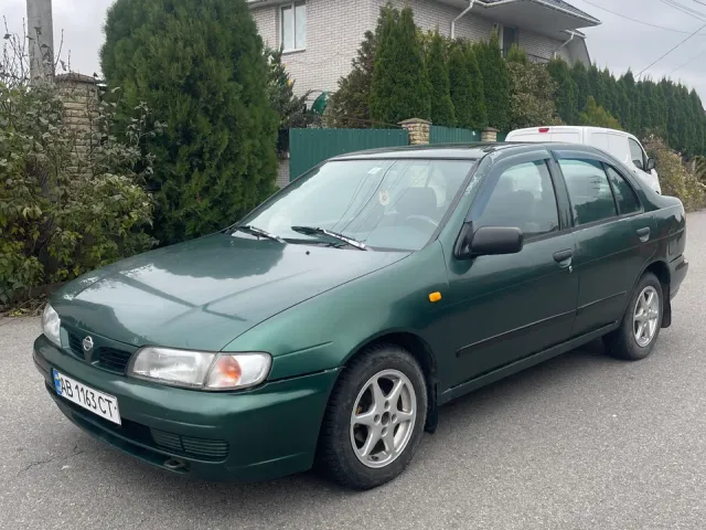 Nissan Almera - фото 1
