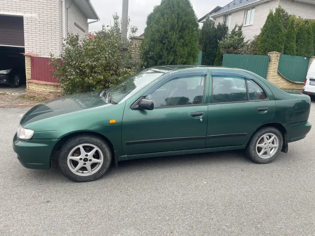 Nissan Almera - фото 2
