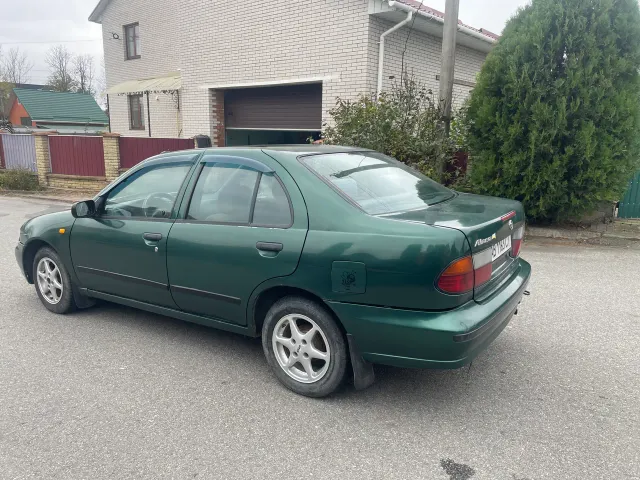Nissan Almera - фото 3