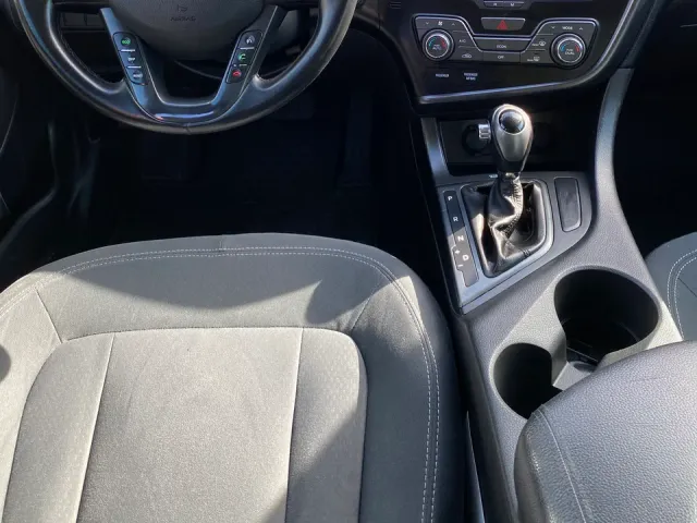 Kia Optima - фото 5