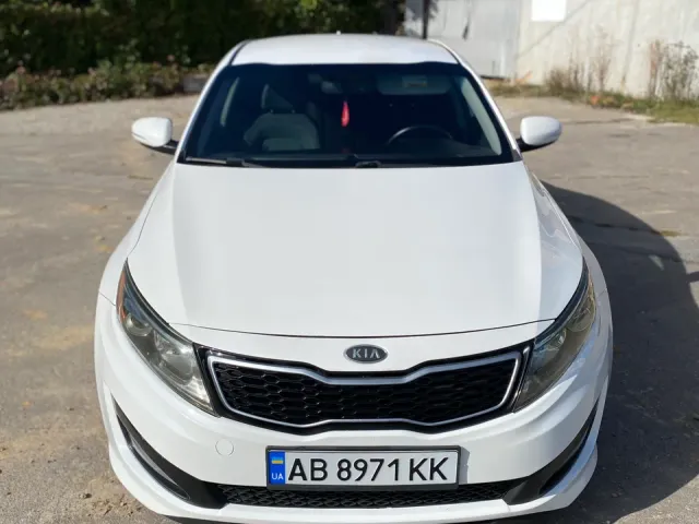 Kia Optima - фото 1