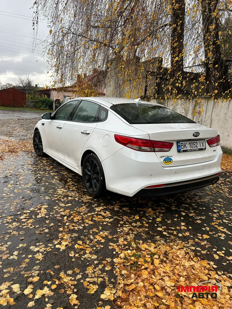 Kia Optima - фото 7