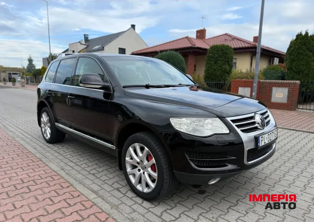 Volkswagen Touareg - фото 1