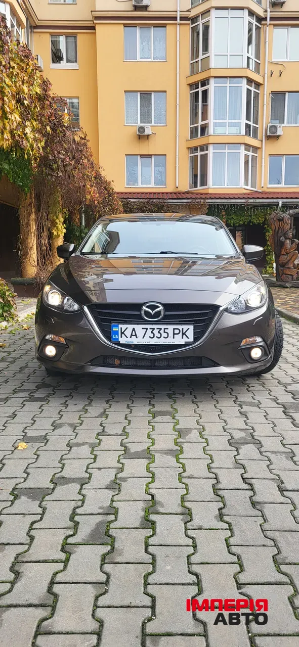 Mazda 3 - фото 8