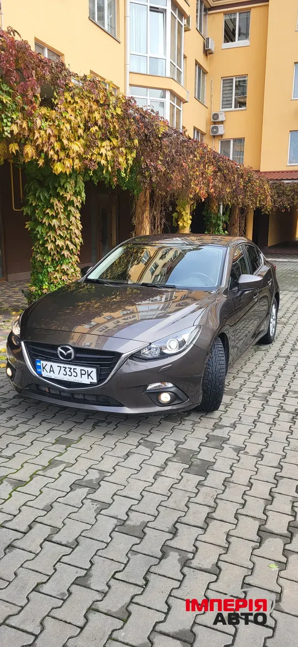 Mazda 3 - фото 2