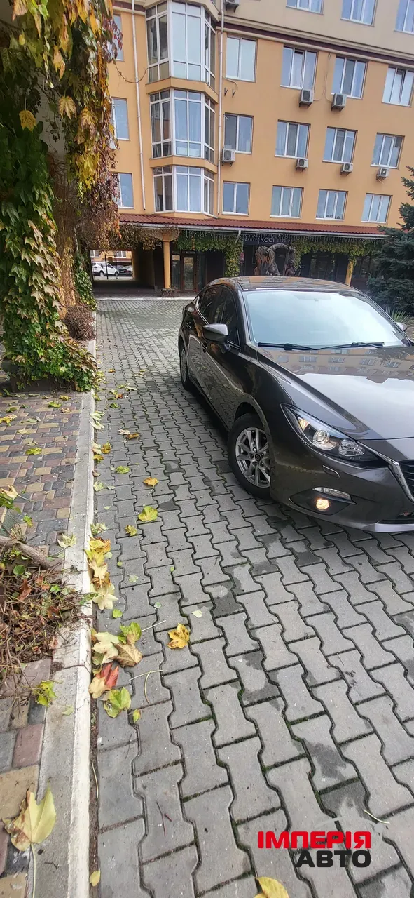 Mazda 3 - фото 14