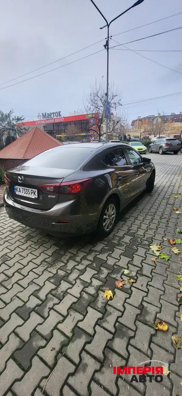 Mazda 3 - фото 7
