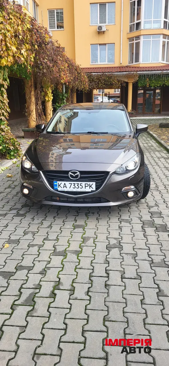 Mazda 3 - фото 1