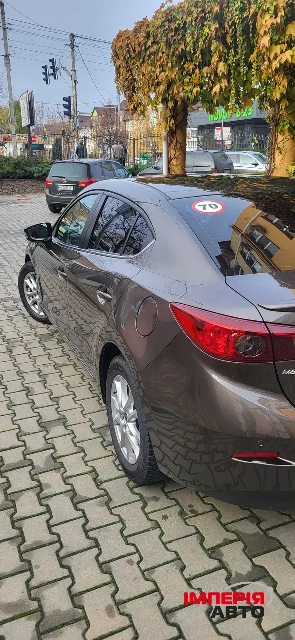 Mazda 3 - фото 10