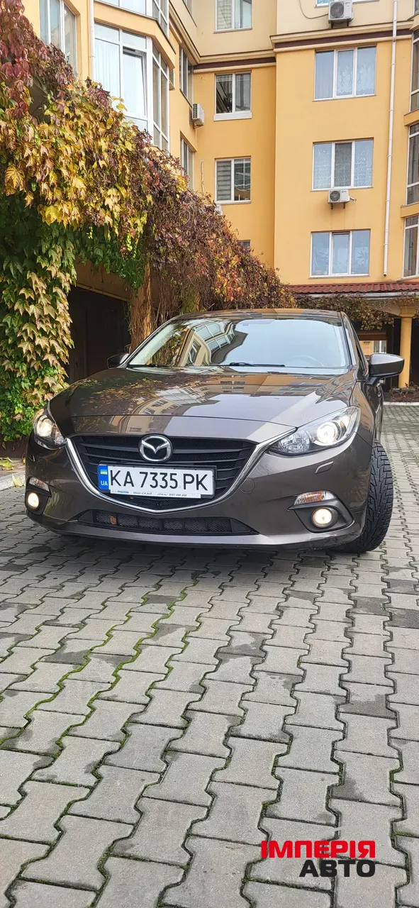 Mazda 3 - фото 9