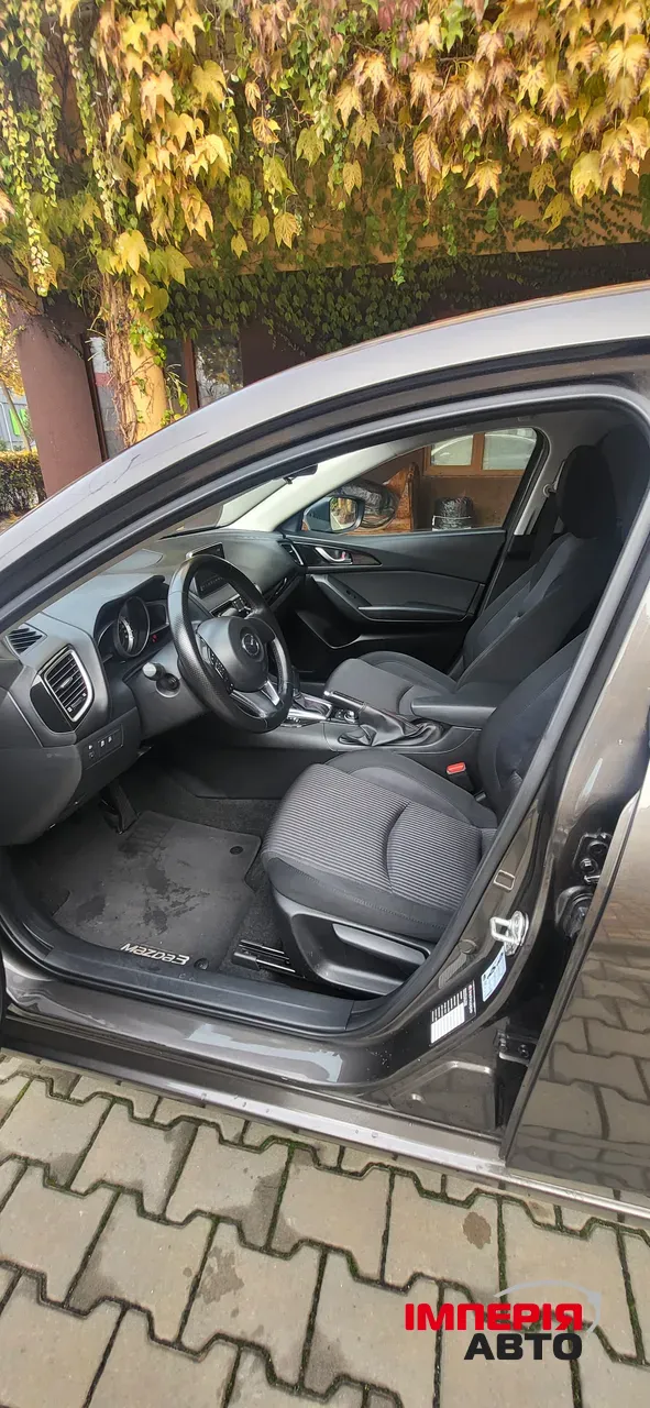 Mazda 3 - фото 13
