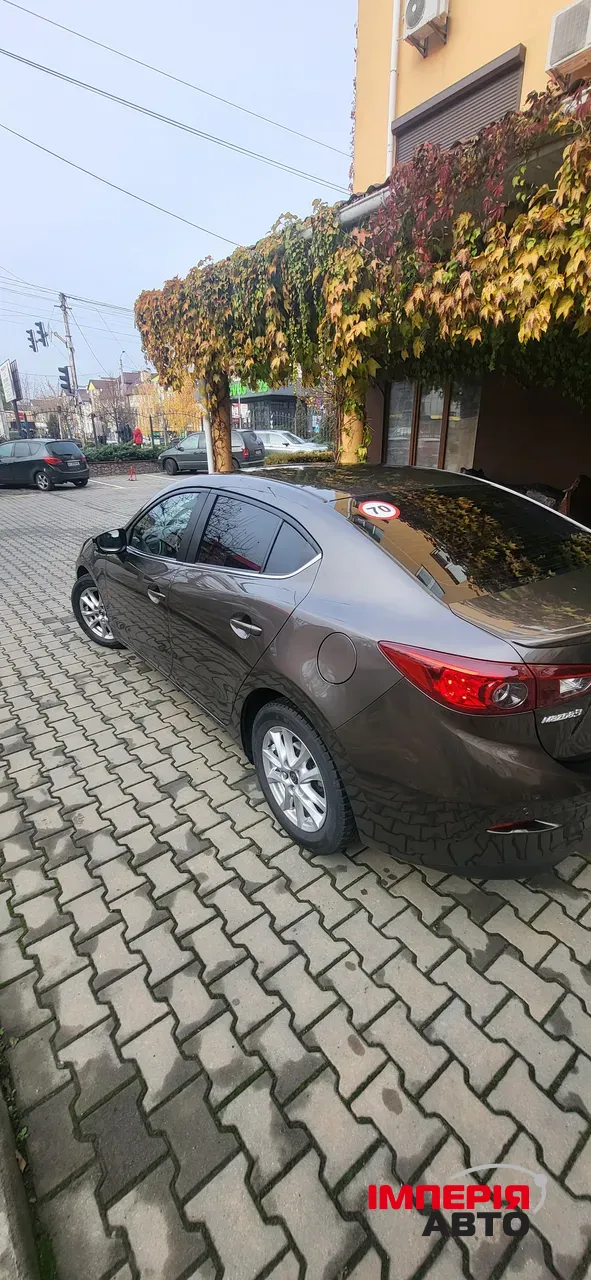 Mazda 3 - фото 6