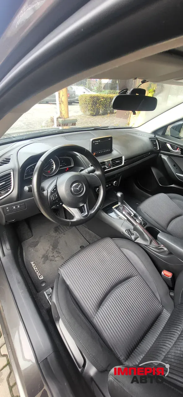 Mazda 3 - фото 11