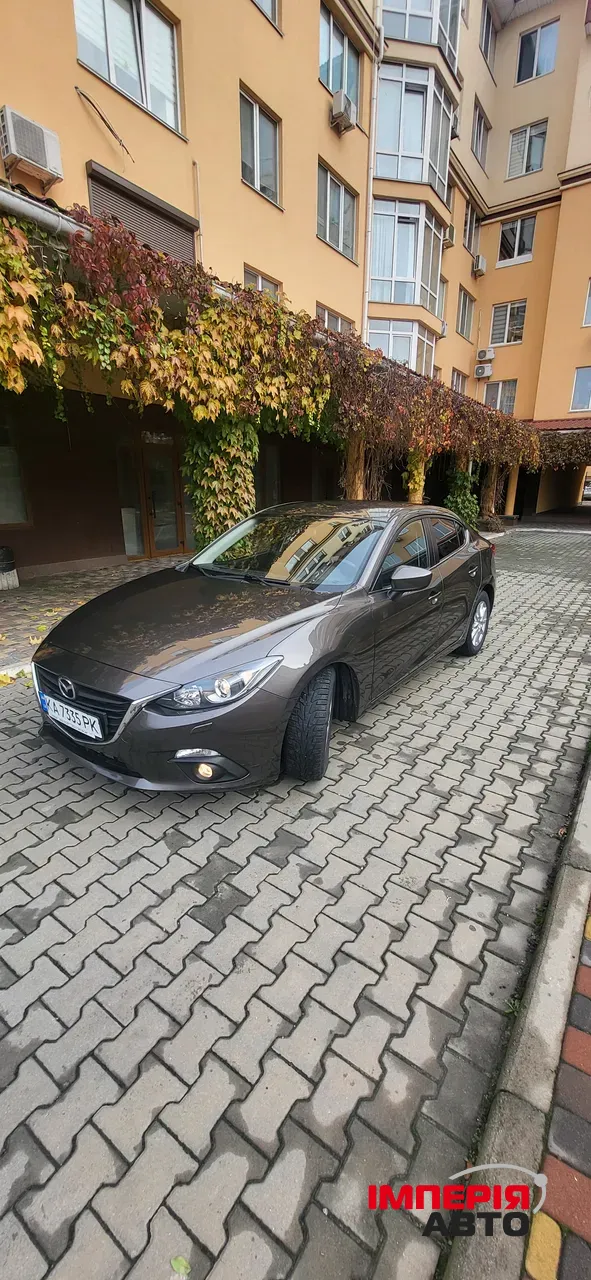 Mazda 3 - фото 4